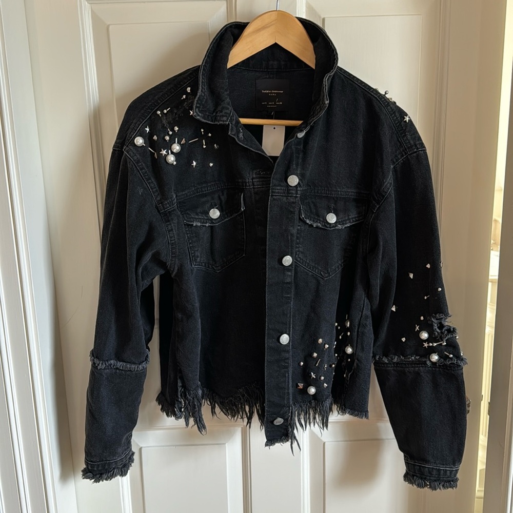 Black denim jacket.
